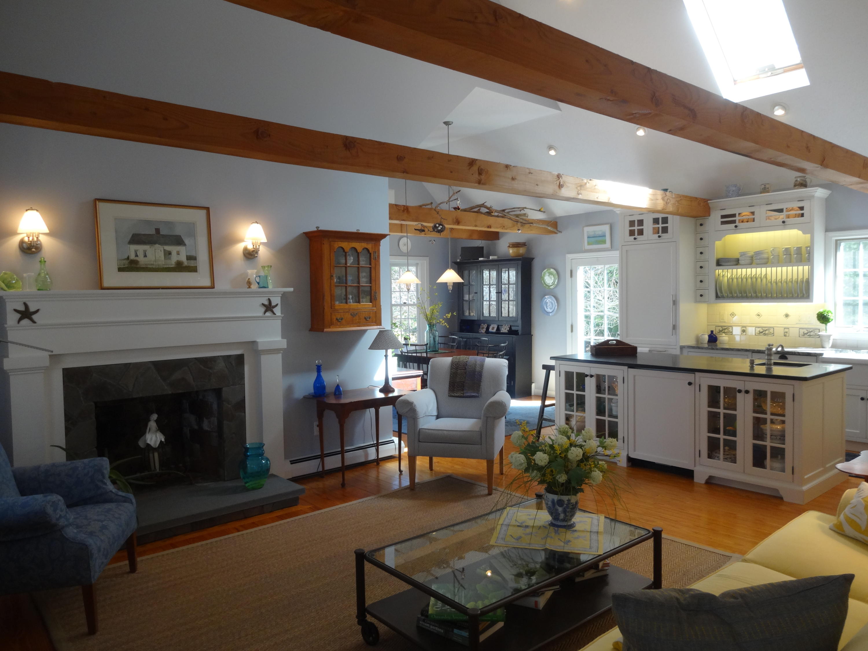 105 Cole Road Eastham, MA 02642 - Photo 5 of 30 a living room with furniture and a fireplace