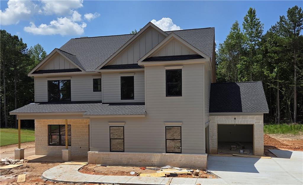 311 Rockwell Church Road Northeast Auburn, GA 30011 - Photo 1 of 1 a front view of a house with a yard