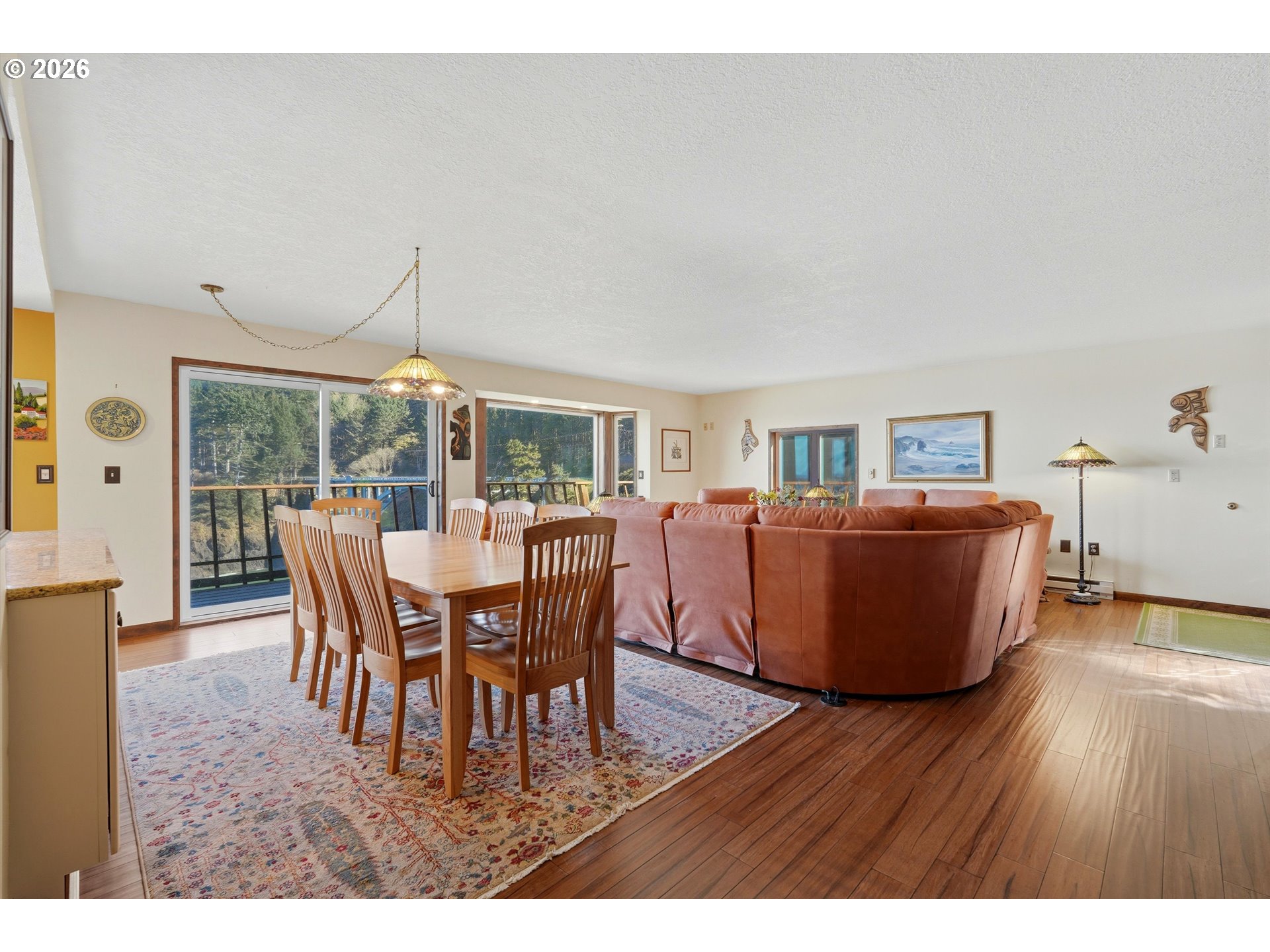 3355 Otter Crest Loop Depoe Bay, OR 97341 - Photo 25 of 35 a dining room with furniture window and wooden floor