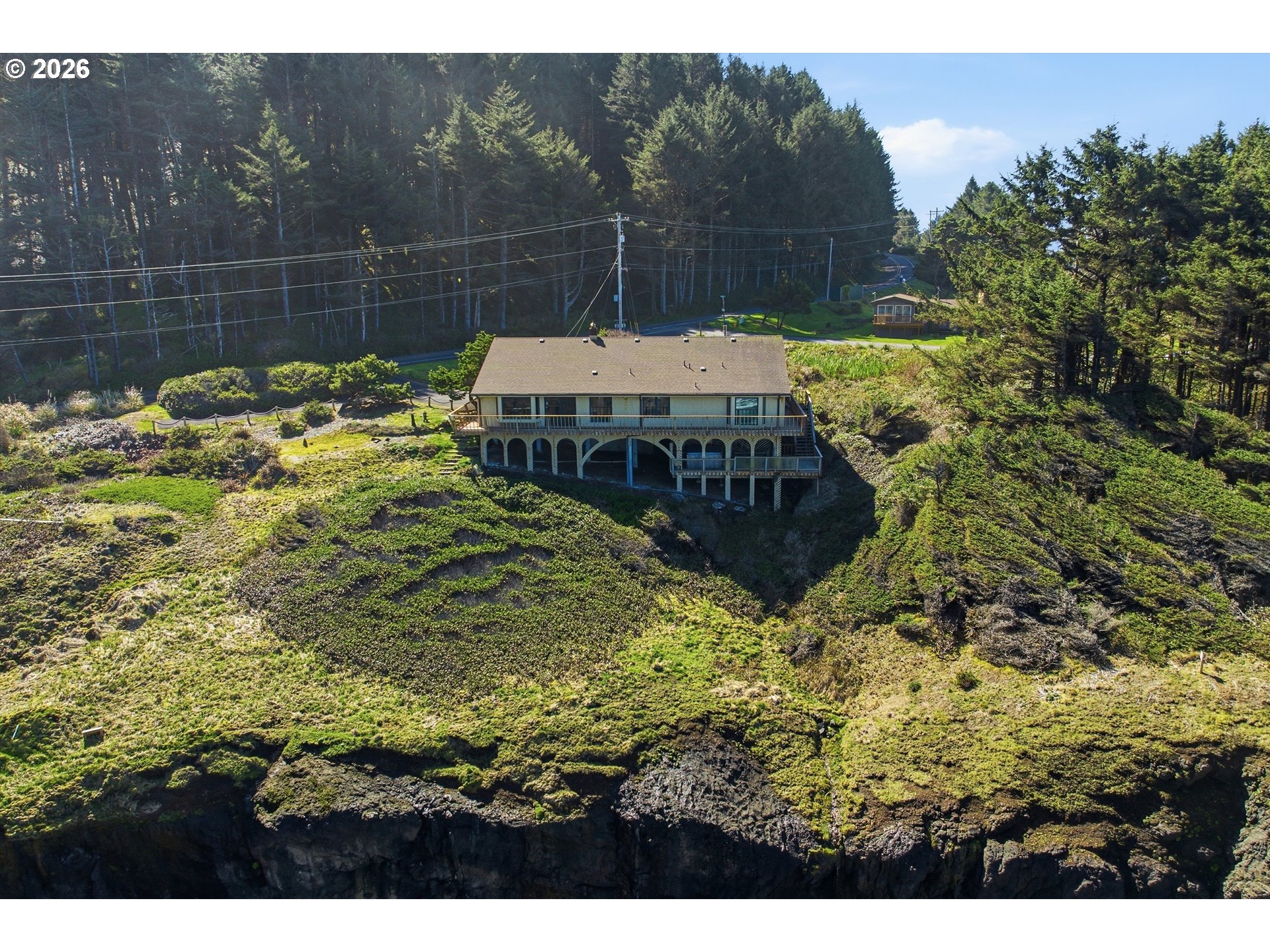 3355 Otter Crest Loop Depoe Bay, OR 97341 - Photo 35 of 35 a aerial view of a house with a yard