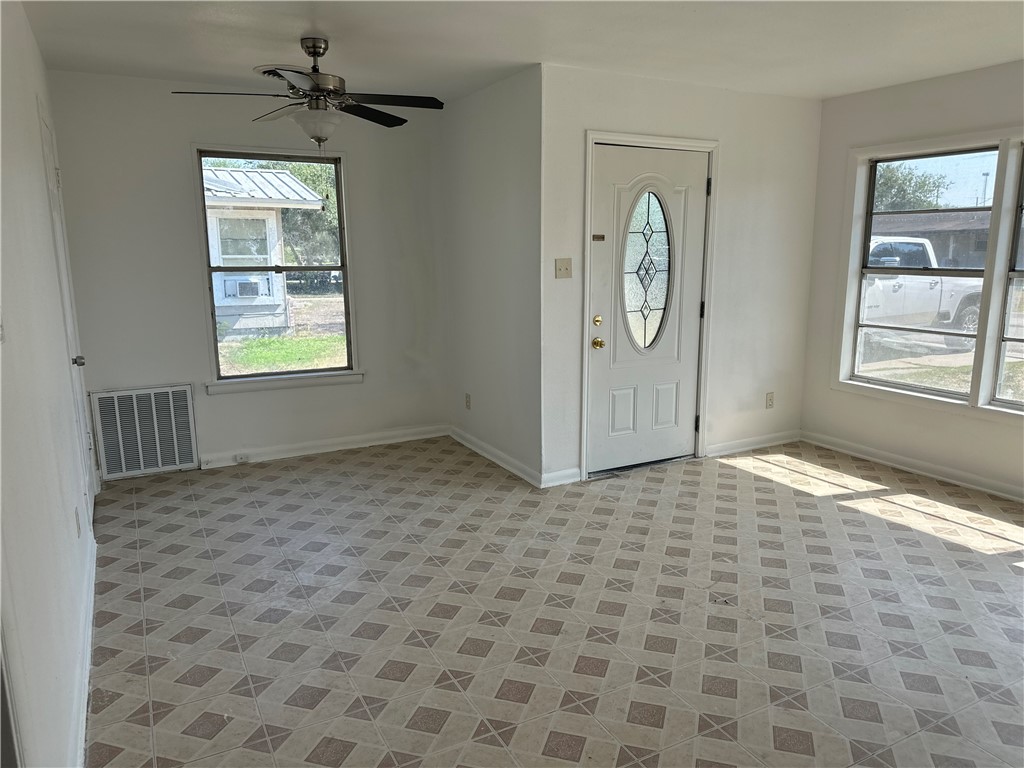 317 Redwood Drive Mathis, TX 78368 - Photo 7 of 26 a view of an empty room and window
