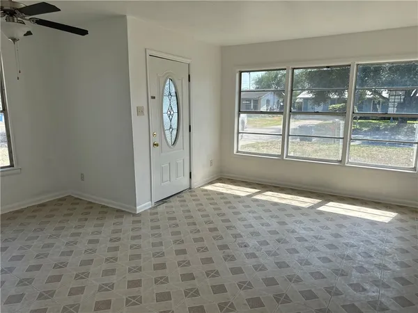 an empty room with windows