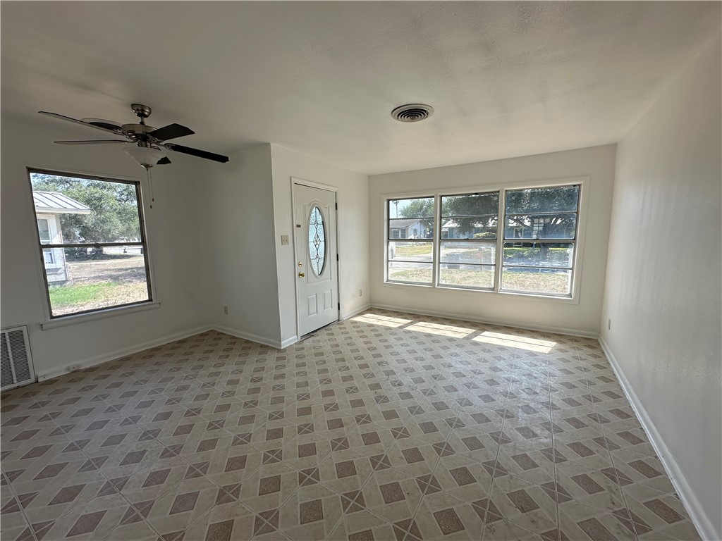 317 Redwood Drive Mathis, TX 78368 - Photo 10 of 26 a view of an empty room and window