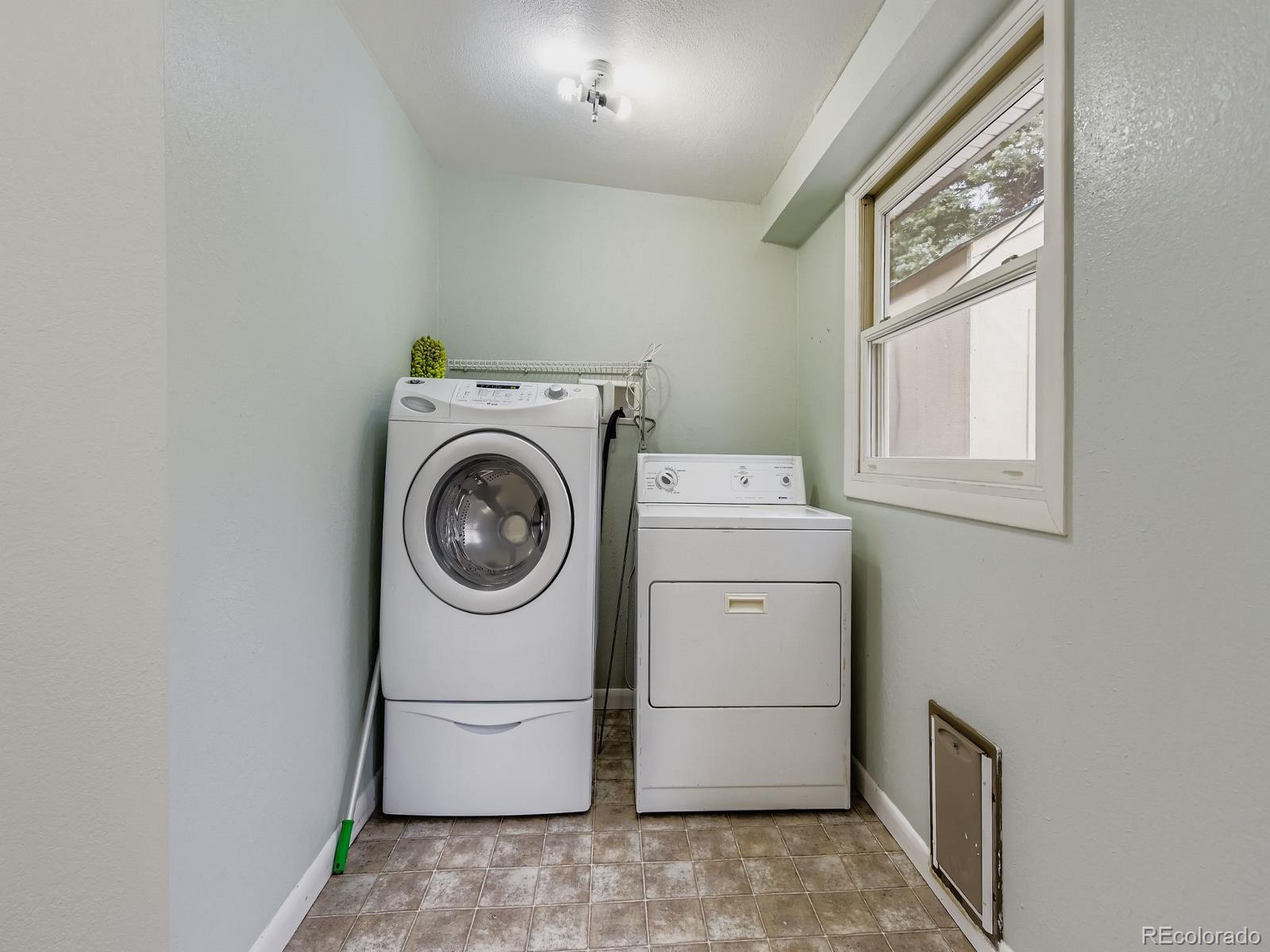 6536 South Kit Carson Street Centennial, CO 80121 - Photo 21 of 32 a utility room with dryer and washer