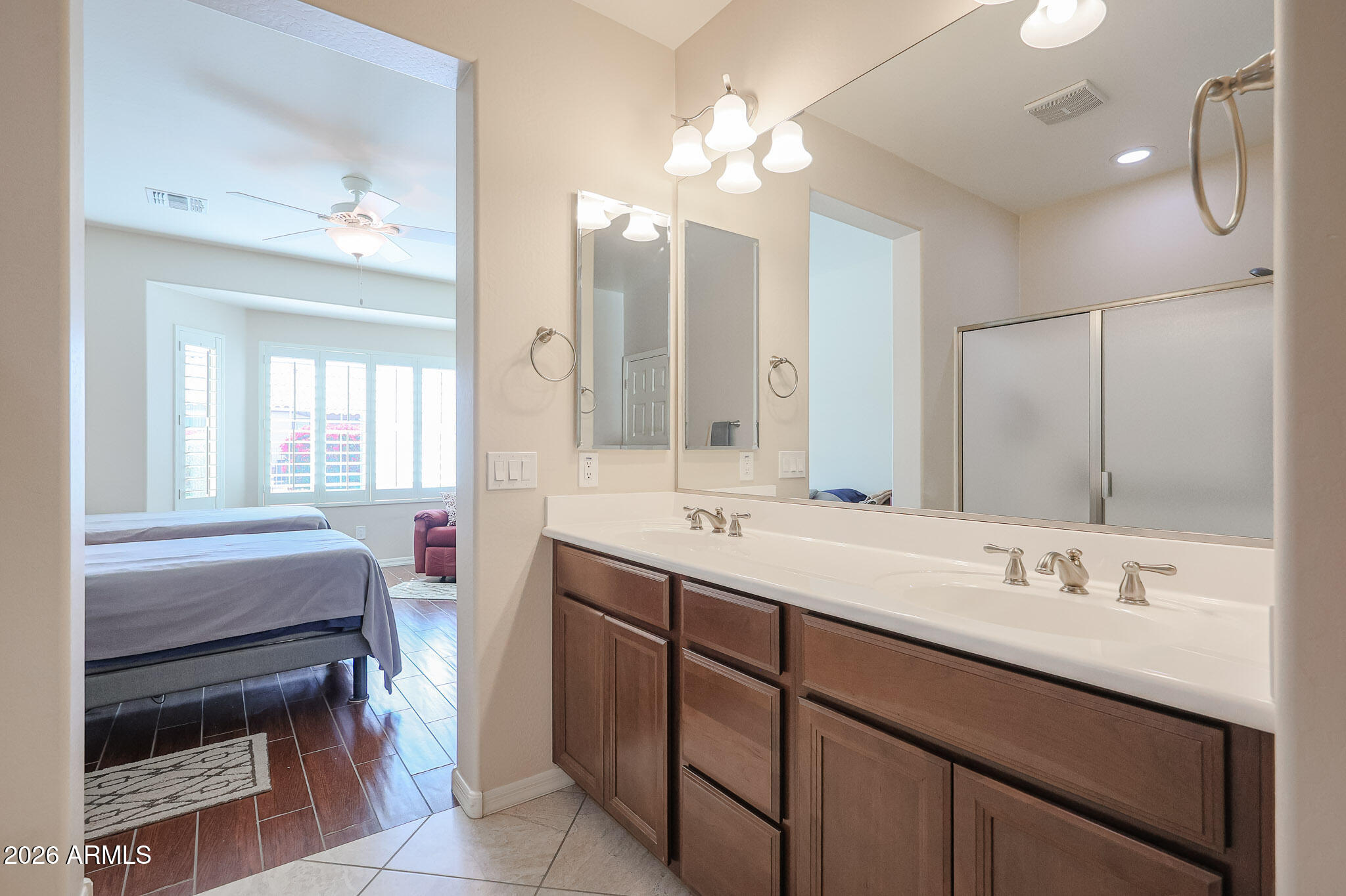 17545 West Fairview Street Goodyear, AZ 85338 - Photo 18 of 55 a bathroom with a double vanity sink mirror and double