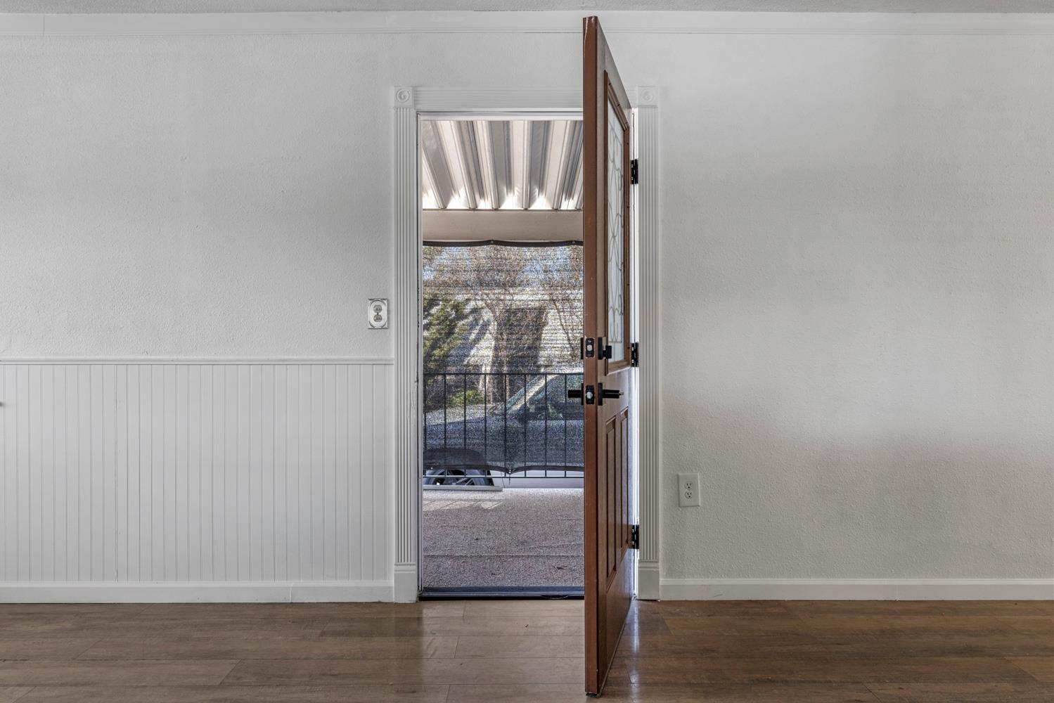 2621 Prescott Road, Unit 79 Modesto, CA 95350 - Photo 8 of 41 a view of entryway with wooden floor