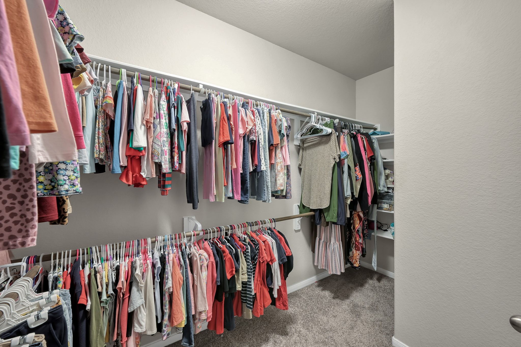 29211 Sequoia Tree Trail Spring, TX 77386 - Photo 15 of 32 a view of walk in closet with clothes