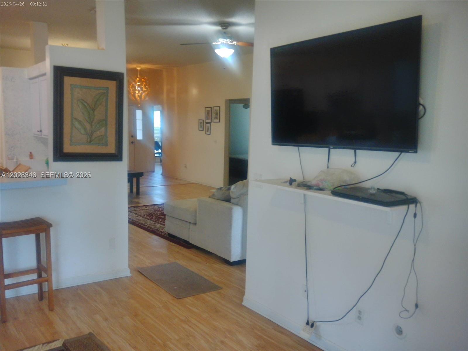 1641 Spring Oaks Lane Jacksonville, FL 32221 - Photo 36 of 44 a living room with furniture and a flat screen tv