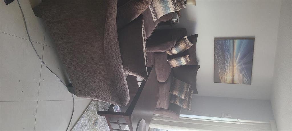 625 Oaks Drive, Unit 704 Pompano Beach, FL 33069 - Photo 8 of 10 a view of staircase with wooden floor