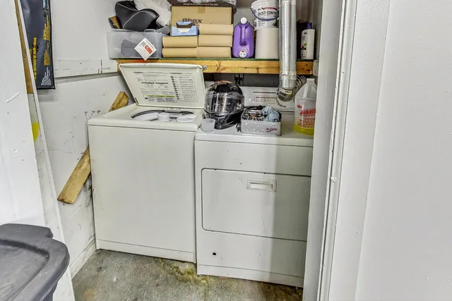 a view of entryway with wooden wall