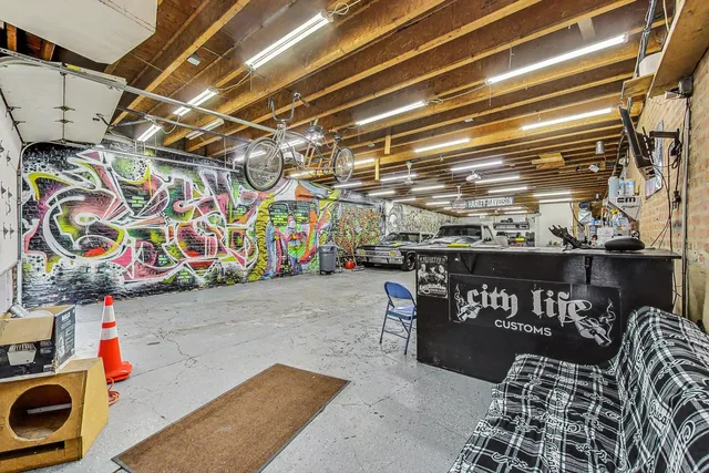 a view of parking garage with cars