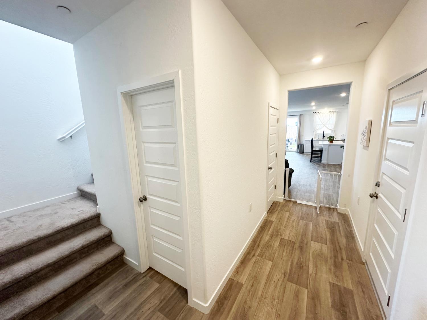 1757 Klamath Road South Madera, CA 93636 - Photo 5 of 33 a view of a bedroom with wooden floor and staircase