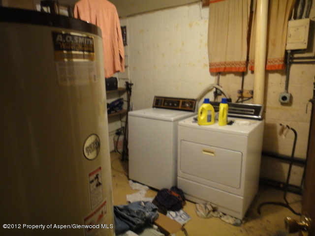 409 East 4th Street Rifle, CO 81650 - Photo 16 of 19 a room with storage and utility