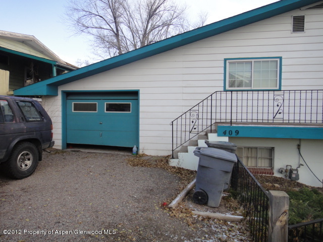 409 East 4th Street Rifle, CO 81650 - Photo 19 of 19 a view of a house with a patio