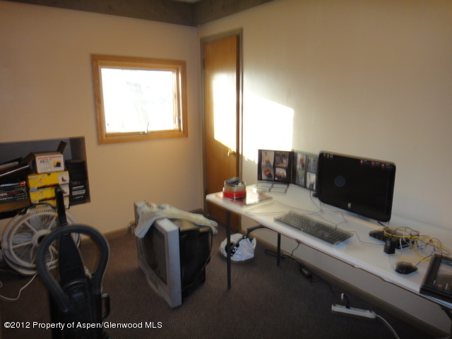 409 East 4th Street Rifle, CO 81650 - Photo 3 of 19 a view of workspace with lounge chair