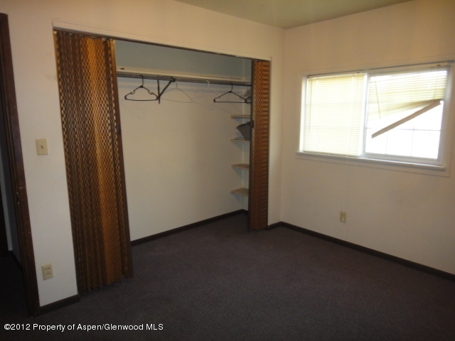 409 East 4th Street Rifle, CO 81650 - Photo 9 of 19 a view of an empty room with a window