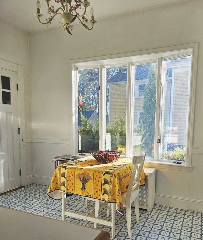 60 Maple Street Framingham, MA 01702 - Photo 14 of 24 a bedroom with a bed and a window