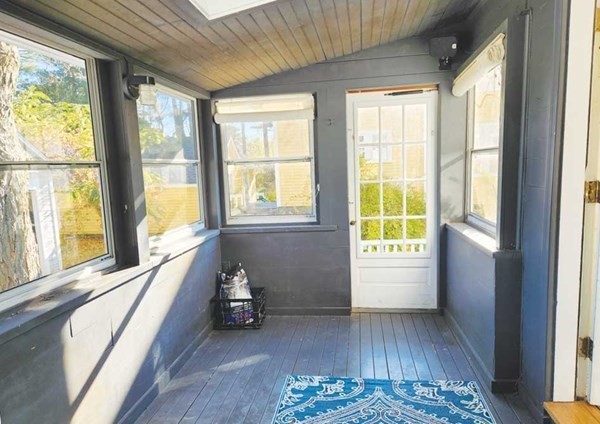 60 Maple Street Framingham, MA 01702 - Photo 15 of 24 a living room with furniture and a large window
