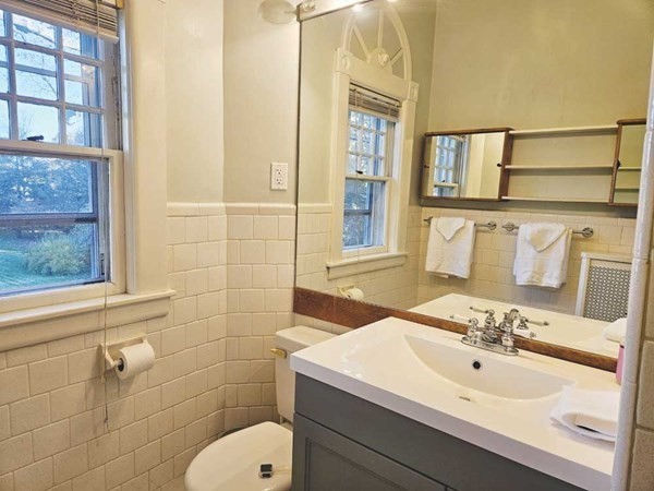 60 Maple Street Framingham, MA 01702 - Photo 20 of 24 a bathroom with a sink a toilet and shower