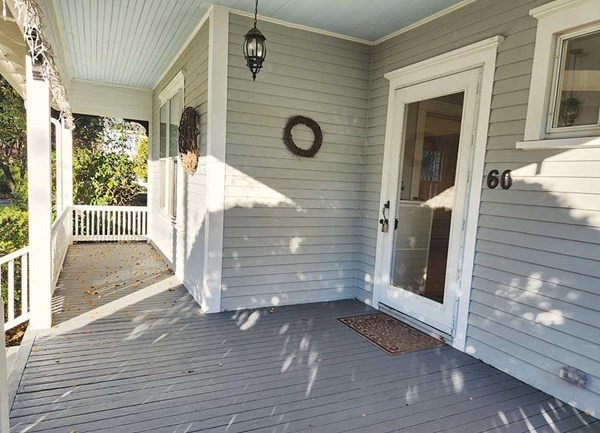 60 Maple Street Framingham, MA 01702 - Photo 4 of 24 a view of outdoor space wooden floor and windows