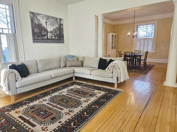60 Maple Street Framingham, MA 01702 - Photo 8 of 24 a living room with furniture and wooden floor