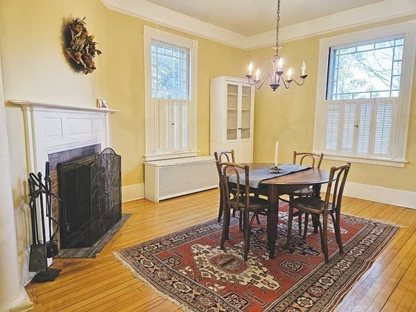 60 Maple Street Framingham, MA 01702 - Photo 9 of 24 a view of a dining room with furniture window and wooden floor