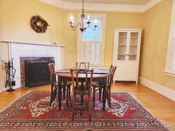 60 Maple Street Framingham, MA 01702 - Photo 10 of 24 a view of a dining room with furniture window and wooden floor