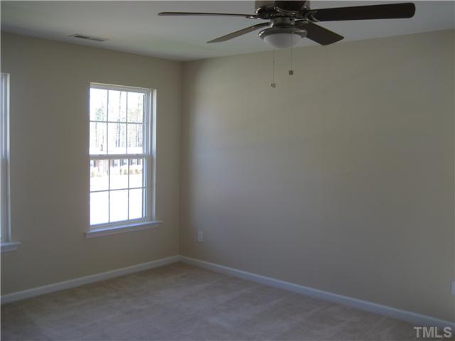 229 Forbes Road, Unit LOT62 Wake Forest, NC 27587 - Photo 9 of 12 Master bedroom is spacious and features 2 walk-in closets and one reach-in closet.