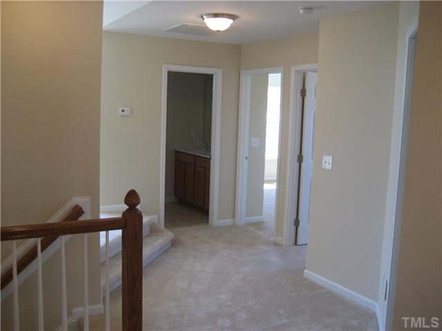 229 Forbes Road, Unit LOT62 Wake Forest, NC 27587 - Photo 10 of 12 2cd floor has open hallways, 4 bedrooms and 3 full baths plus a large laundry room and the playroom.