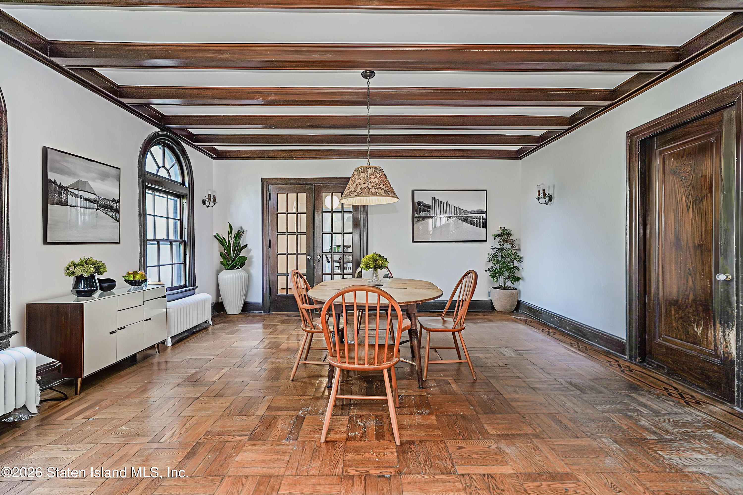 12 Silver Lake Road Staten Island, NY 10301 - Photo 12 of 33 a dining room with furniture and window