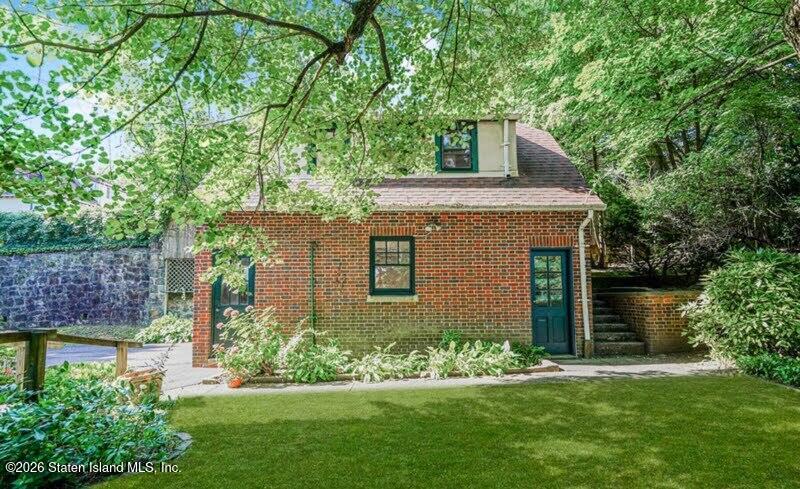 12 Silver Lake Road Staten Island, NY 10301 - Photo 23 of 33 front view of a house with a yard