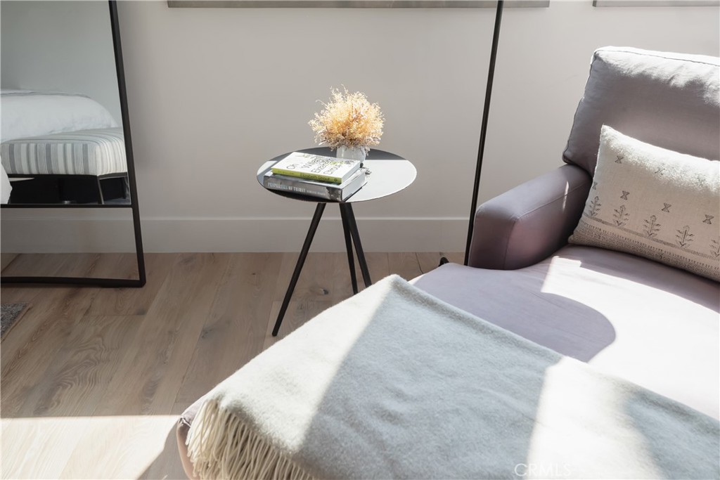 3218 Morningside Drive Hermosa Beach, CA 90254 - Photo 15 of 43 a bedroom with a bed and a potted plant