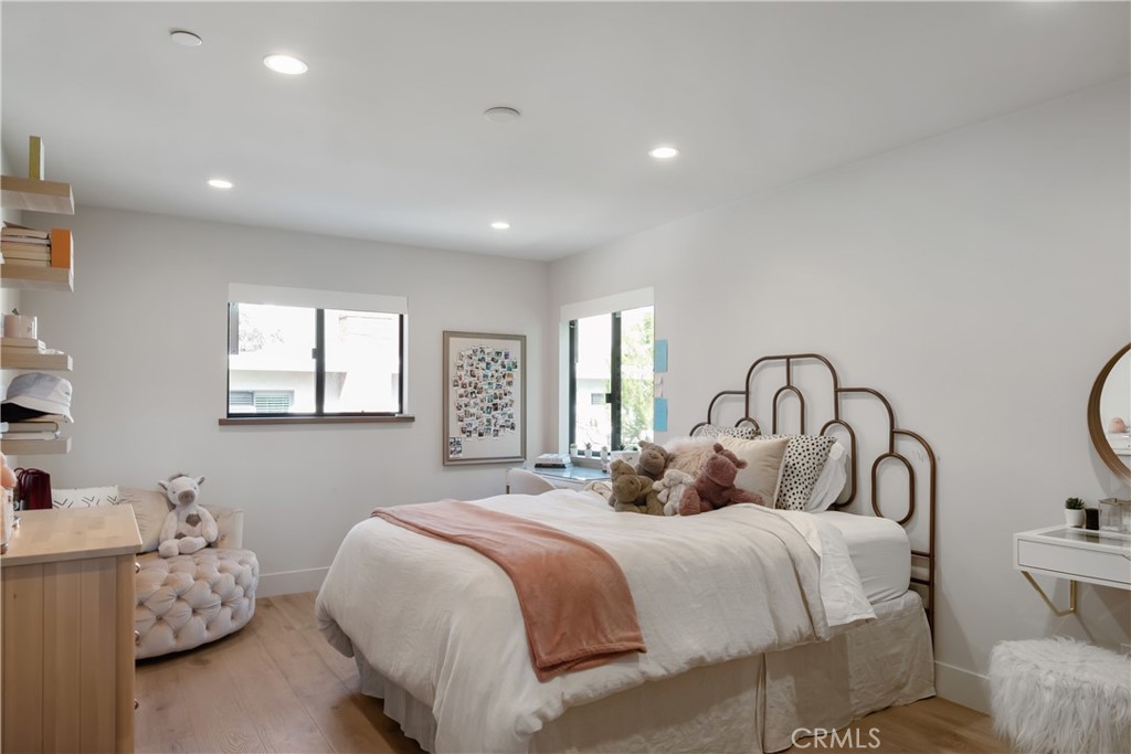 3218 Morningside Drive Hermosa Beach, CA 90254 - Photo 22 of 43 a bedroom with bed and a window