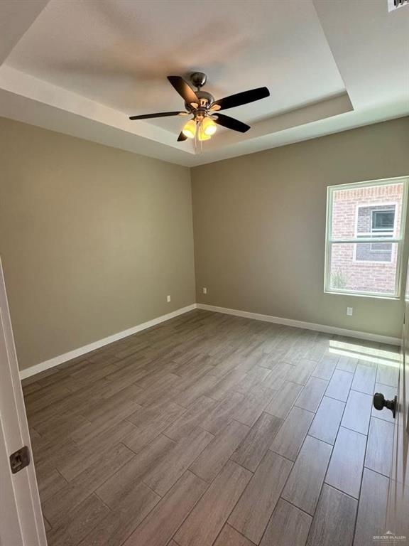 5609 Nightingale Avenue, Unit 2 Mission, TX 78573 - Photo 10 of 13 a view of an empty room with a window