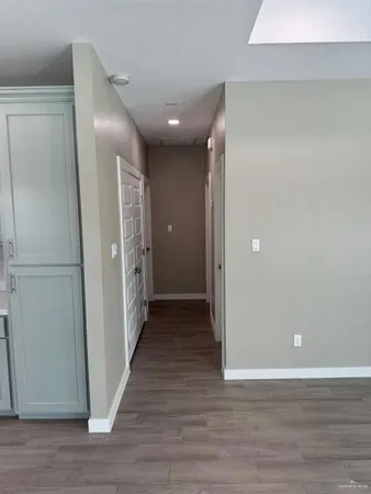 a kitchen with sink and cabinets