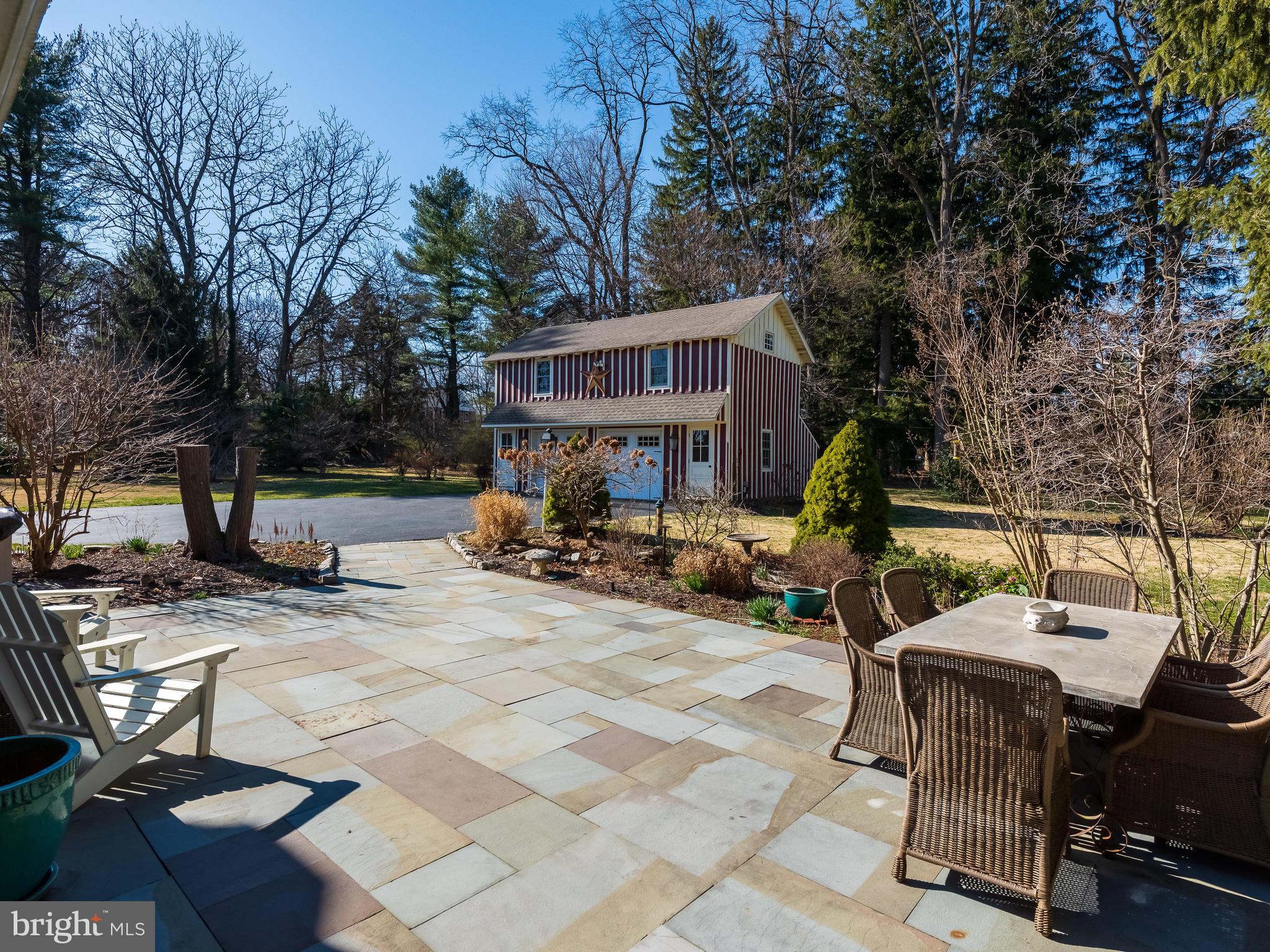 638 Conestoga Road Berwyn, PA 19312 - Photo 49 of 54 Blue Slate Patio with built in lawn sprinklers
