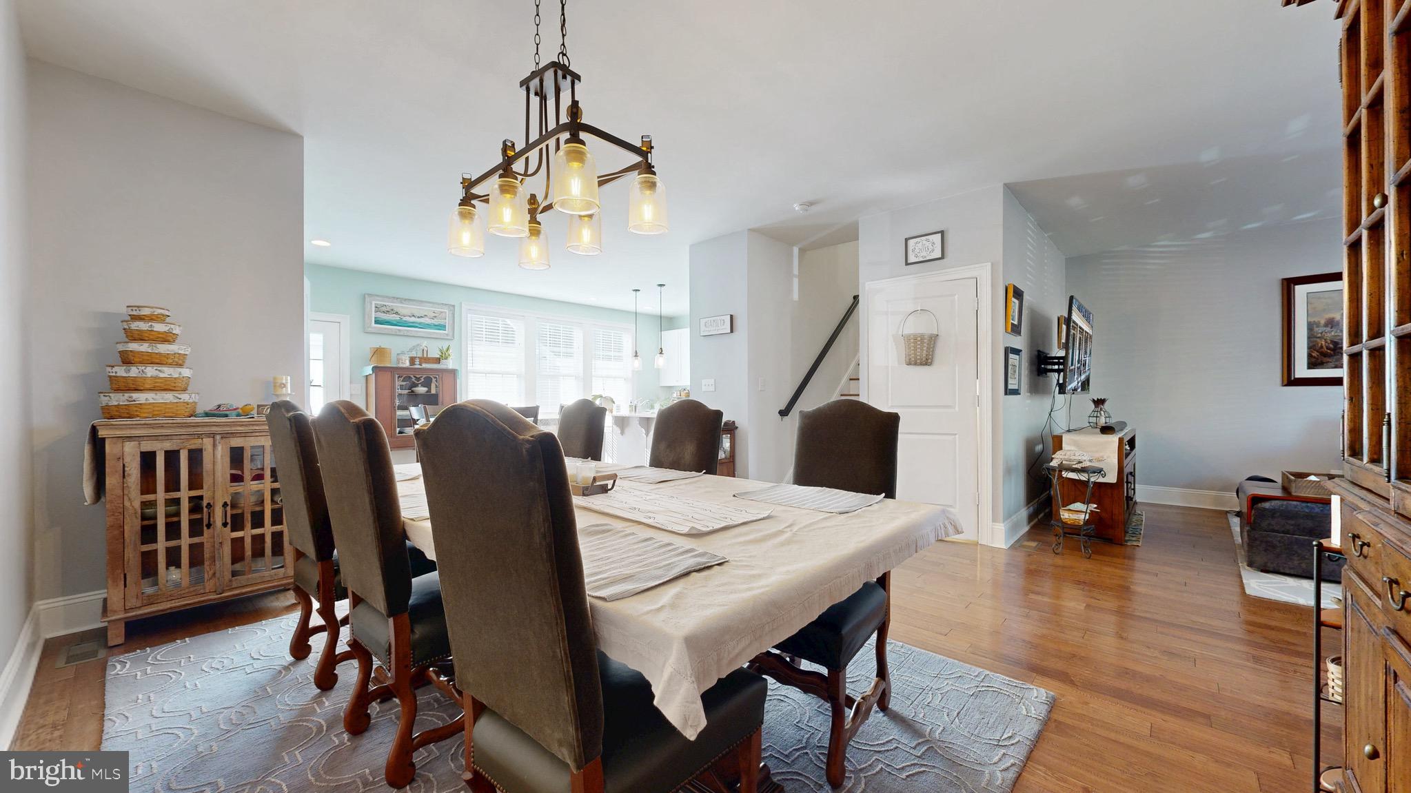 819 Mapleton Avenue Middletown, DE 19709 - Photo 12 of 56 a view of a dining room with furniture and wooden floor