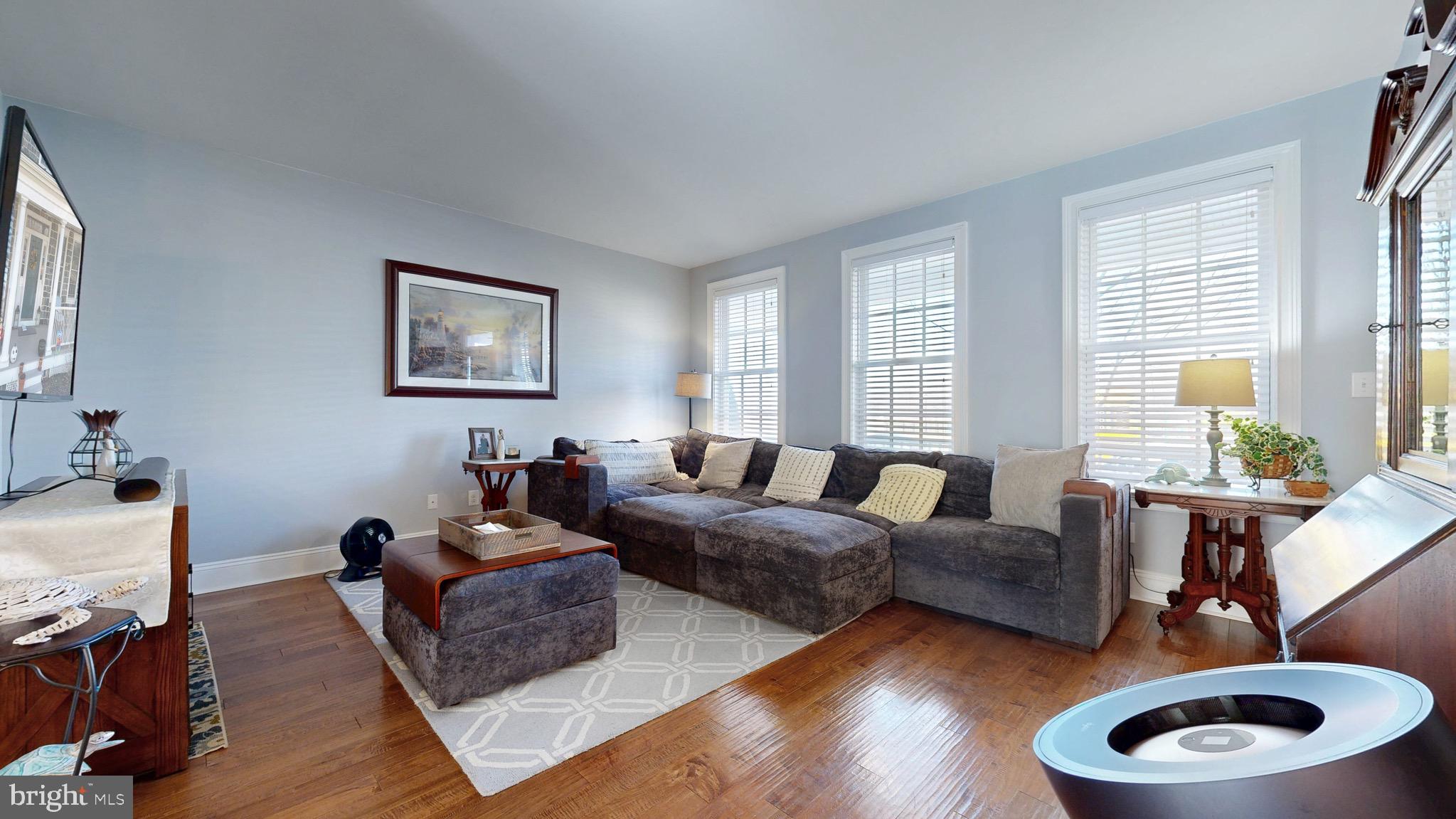 819 Mapleton Avenue Middletown, DE 19709 - Photo 19 of 56 a living room with furniture and a wooden floor