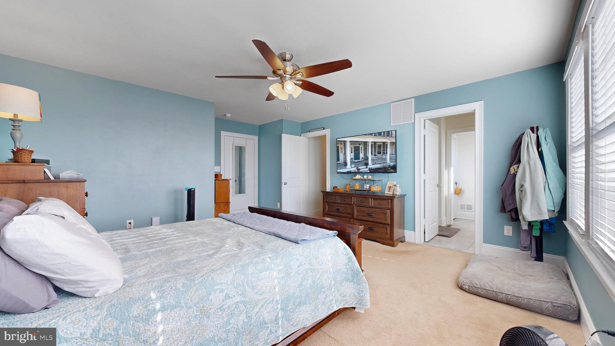 819 Mapleton Avenue Middletown, DE 19709 - Photo 23 of 56 a bedroom with a bed and a walk in closet