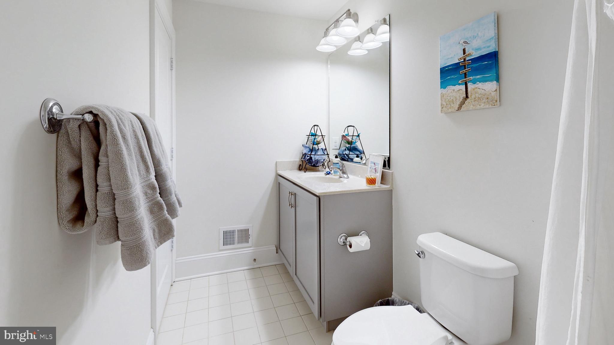 819 Mapleton Avenue Middletown, DE 19709 - Photo 31 of 56 a bathroom with a toilet and a sink