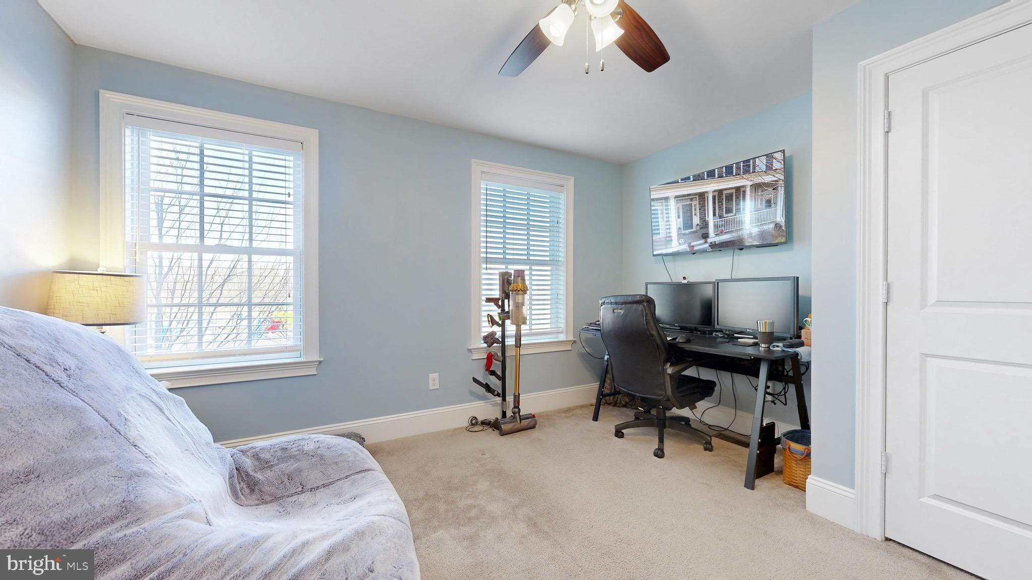 819 Mapleton Avenue Middletown, DE 19709 - Photo 32 of 56 a bedroom that has a bed and a desk in it