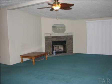 3621 Perdido Lake Road Cantonment, FL 32533 - Photo 13 of 24 View of the living room from the kitchen.
