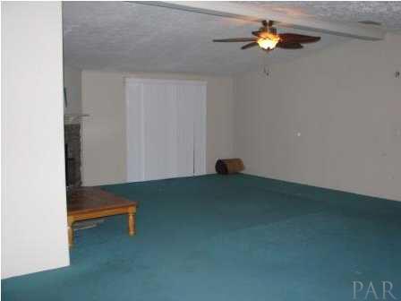 3621 Perdido Lake Road Cantonment, FL 32533 - Photo 15 of 24 Another view of the living room from the kitchen.