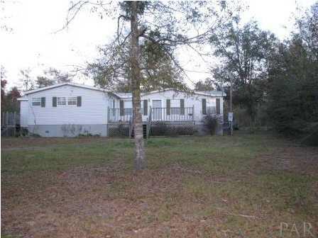 3621 Perdido Lake Road Cantonment, FL 32533 - Photo 3 of 24 Another view of the front standing in the front yard.