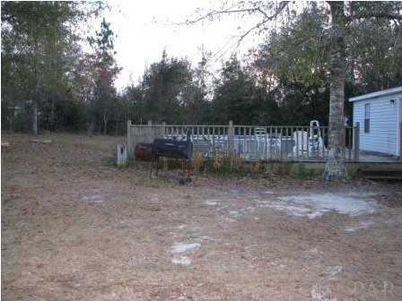3621 Perdido Lake Road Cantonment, FL 32533 - Photo 5 of 24 Back deck that has plenty of room for entertaining.