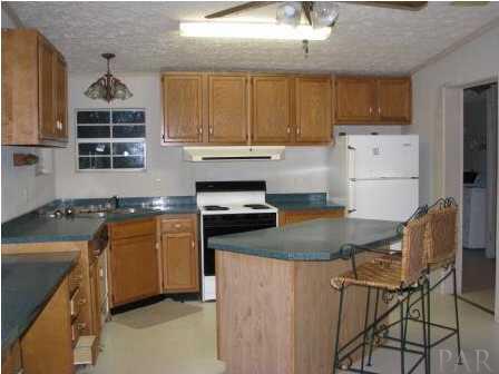 3621 Perdido Lake Road Cantonment, FL 32533 - Photo 8 of 24 View of kitchen from dining area