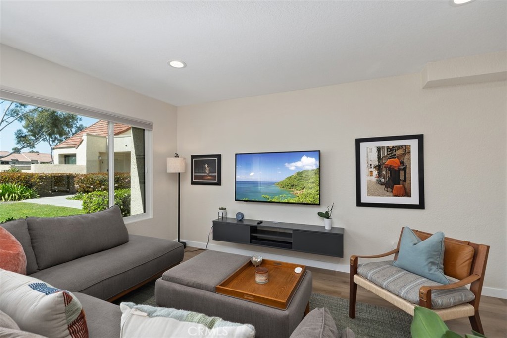 13 Pearl Laguna Niguel, CA 92677 - Photo 13 of 25 a living room with furniture and a flat screen tv