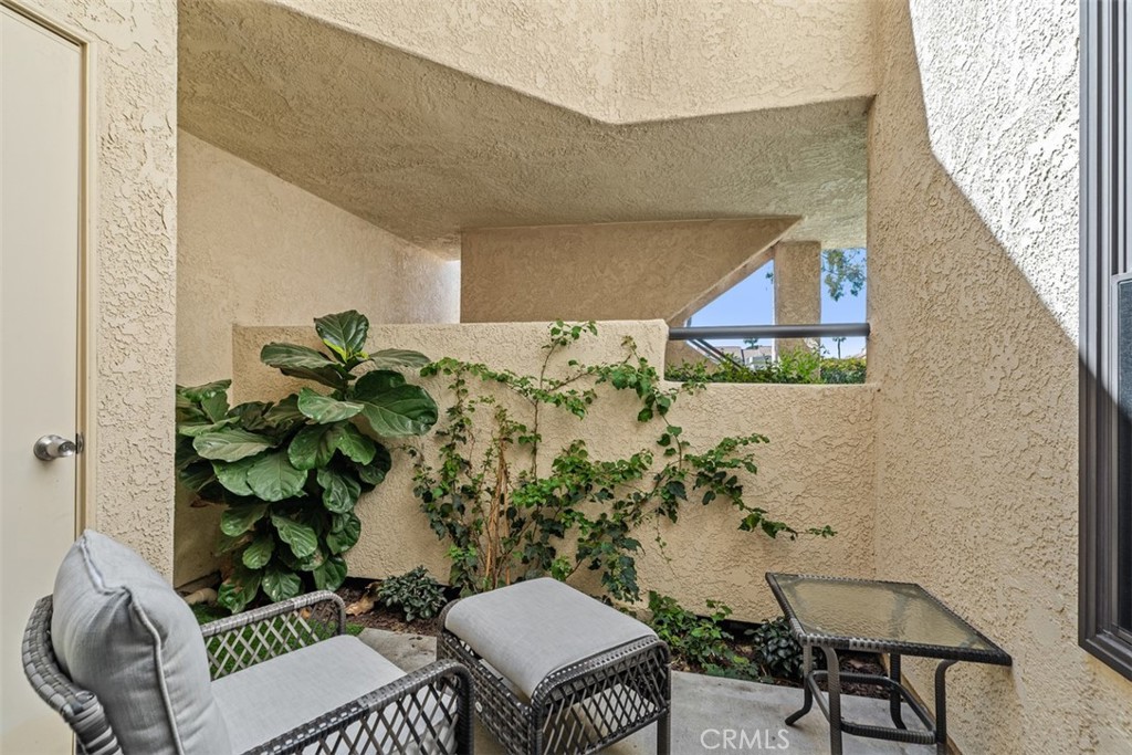13 Pearl Laguna Niguel, CA 92677 - Photo 19 of 25 a balcony with a potted plant