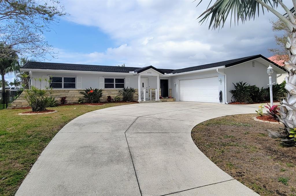 1732 Boca Raton Court Punta Gorda, FL 33950 - Photo 64 of 64 a view of a house with a patio
