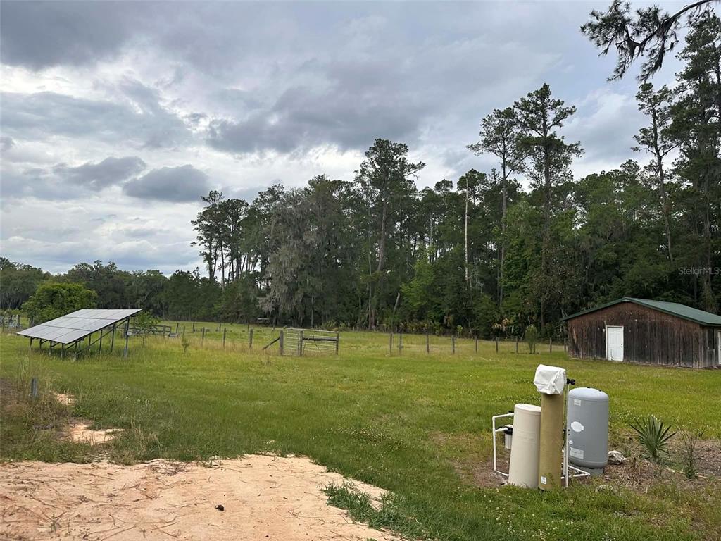 6800 Northeast 175th Street Road Citra, FL 32113 - Photo 15 of 27 a house view with a lake view